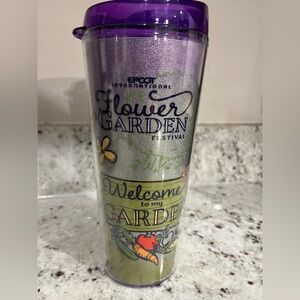 Lightly used Disney Epcot International Flower Garden Figment cup with lid